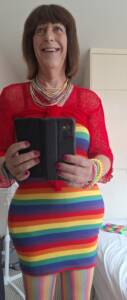 Feminine Companion and Escort wearing her pride outfit